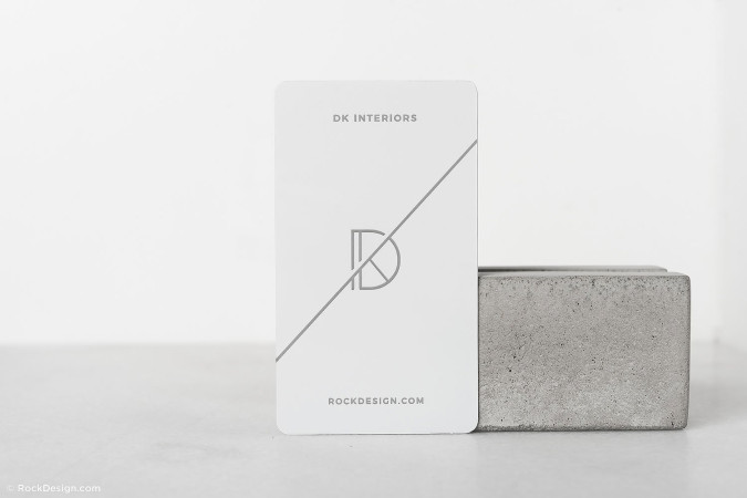 Creative minimalist white name card design – DK Interiors