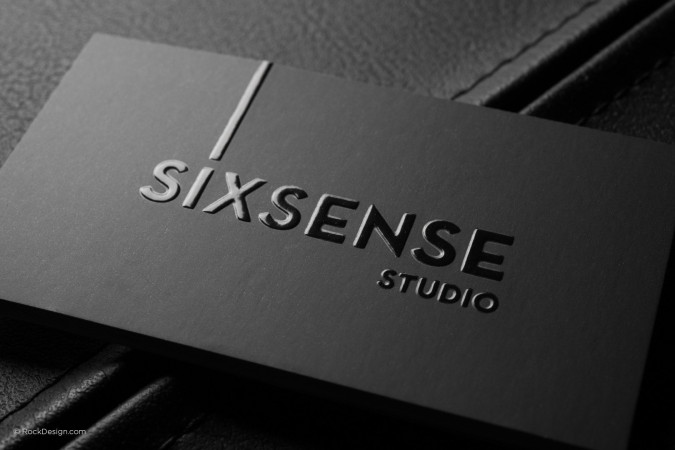Modern black and white silk business card with emboss and spot UV - Sixsense