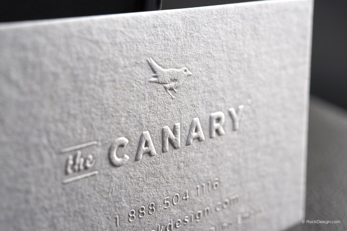 Minimalist blind emboss premium white business card - The Canary