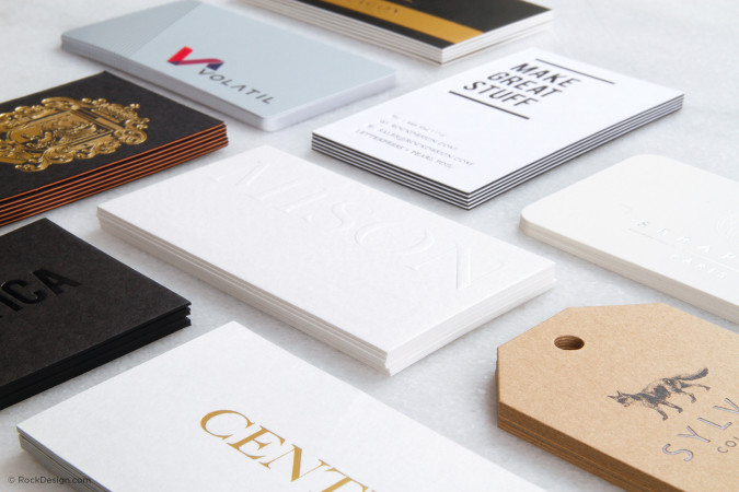 Assortment of luxury business cards with various finishes